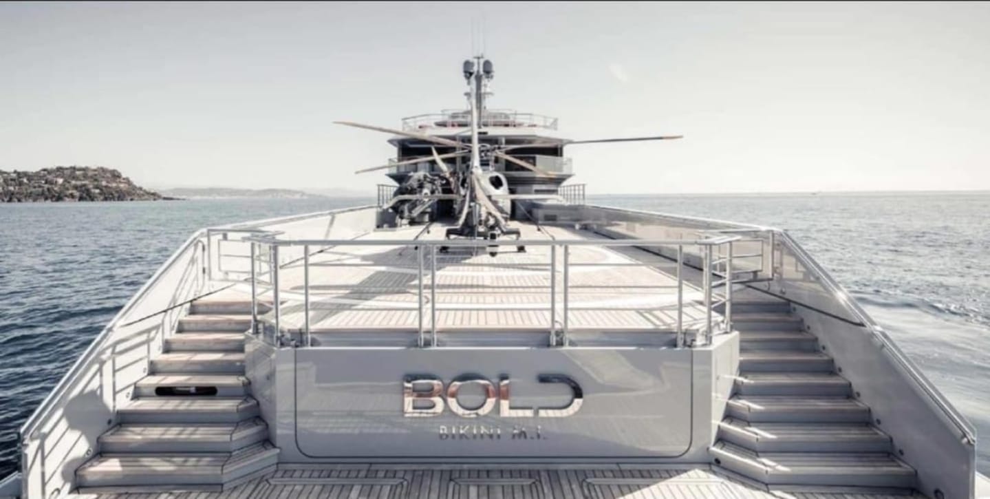 BOLD 85m luxury superyacht available for charter in Monaco with helipad, pool and diving center